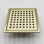 AQUADOM OCEANIC 6"x6" Square Shower Drain Grid Cover, with hair strainer, Marine-Grade 316 stainless steel in Brushed Gold