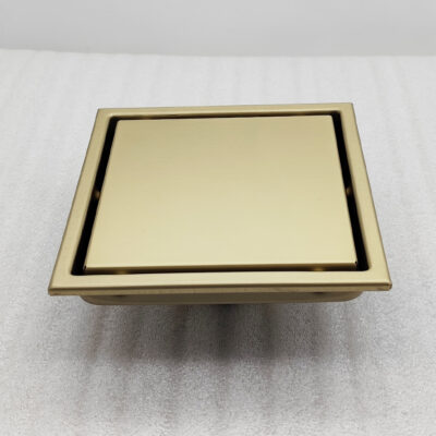 AQUADOM OCEANIC  6″x6″ Square Shower Drain Tile-In, with hair strainer, Marine-Grade 316 stainless steel in Brushed Gold