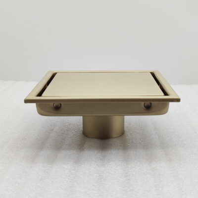 AQUADOM OCEANIC  6″x6″ Square Shower Drain Tile-In, with hair strainer, Marine-Grade 316 stainless steel in Brushed Gold