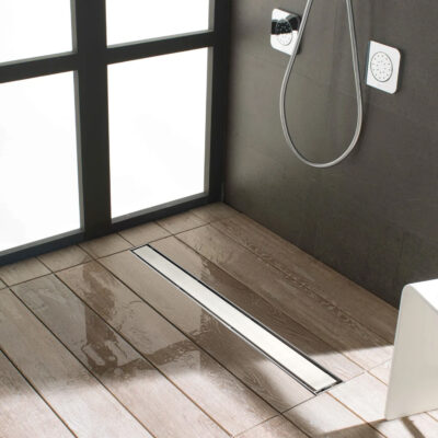 AQUADOM OCEANIC Linear Shower Drain Tile-In, with hair strainer and adjustment feet, Marine-Grade 316 stainless steel - Satin, 24"x2 3/4"x7/8"